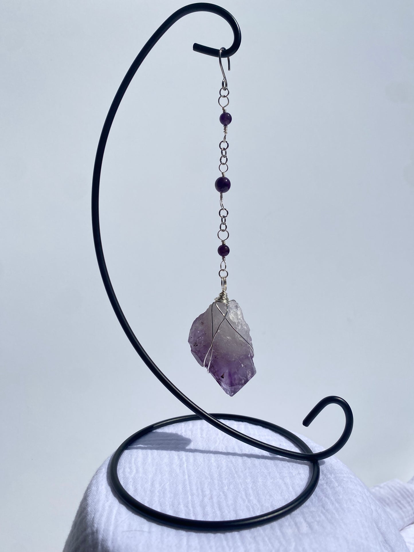 Amethyst Wrapped Gemstone