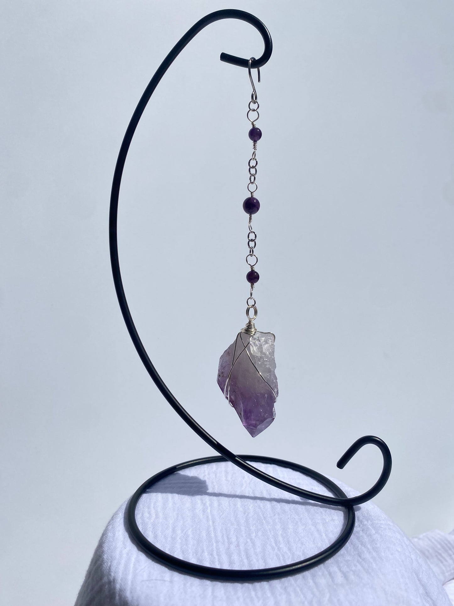 Amethyst Wrapped Gemstone