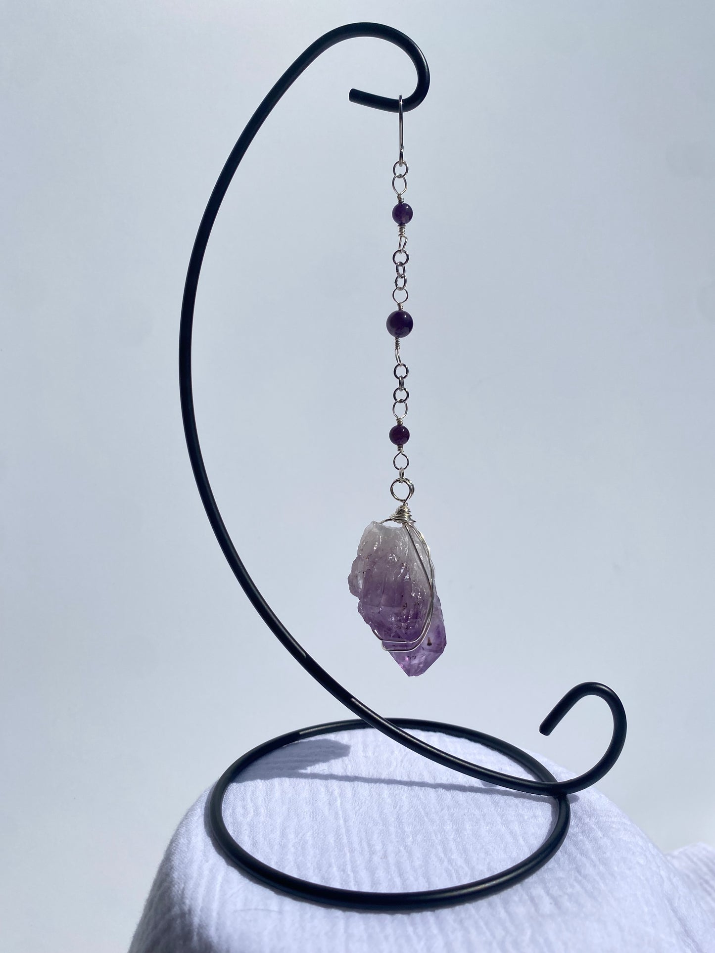 Amethyst Wrapped Gemstone
